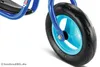 Close-up of a blue balance bike wheel with a black tire and a cyan rim. Produktbild-Vorschau