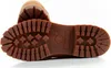The underside of two Timberland boots is shown against a white background. Produktbild-Vorschau