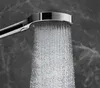 A close-up shot of a modern chrome hand shower head with water spraying out. Anteprima dell’immagine prodotto