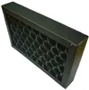 A close-up, angled view of a black air filter with a honeycomb pattern, set against a white background. Náhľad obrázku produktu