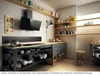 A modern kitchen with a black range hood, wooden countertops, and dark gray cabinets. Náhled obrázku produktu