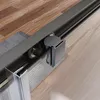 A close-up view of the sliding mechanism and bottom track of a shower enclosure. Produktbild-Vorschau