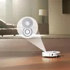 A white robot vacuum cleaner is shown on a wooden floor, projecting an image of its cleaning attachments. Anteprima dell’immagine prodotto