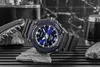 A Casio watch is displayed on rocks with a knife and flask in the background. Voir les images du produit