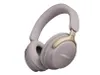 A pair of Bose QC Ultra headphones in Sandstone color, shown from a diagonal angle against a white background. Produktbild-Vorschau