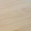 A close-up shot of a light-colored wooden surface, likely bamboo, showing the grain and texture. Produktbild-Vorschau