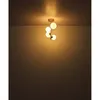 A modern ceiling light fixture with multiple glass globes. Produktbild-Vorschau