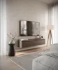 A modern living room with a wall-mounted TV and media console. Náhled obrázku produktu