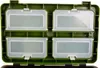 An overhead view of an open green storage box with four transparent compartments. Produktbild-Vorschau