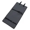 A gray protective pad with straps and buckles, lying flat on a white background. Náhled obrázku produktu