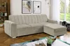 A modern living room with a beige sectional sofa, artwork on the wall, and a large window with a view of greenery. Náhľad obrázku produktu