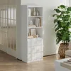 A white bookshelf with drawers is shown in a room with wooden floors and a large plant. Produktbild-Vorschau
