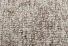 A close-up view of a textured carpet with a melange pattern. Anteprima dell’immagine prodotto