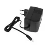 A black power adapter with a coiled cable and a European plug. Produktbild-Vorschau