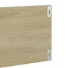 A close-up view of the back of two wooden shelves, showing the mounting hardware. Produktbild-Vorschau