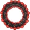 A red Christmas wreath with small red baubles and tinsel attached to a black plastic ring, shown against a white background. Produktbild-Vorschau
