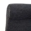 Close-up view of the textured fabric of a dark gray bar stool. Voir les images du produit