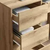 Close-up view of open drawers in a wooden desk. Produktbild-Vorschau
