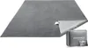A gray rug is shown folded and placed next to its packaging. Produktbild-Vorschau