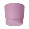 A pink plant pot with a saucer, isolated on a white background. Anteprima dell’immagine prodotto