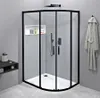 A modern bathroom with a black framed glass shower enclosure. Anteprima dell’immagine prodotto