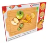 The image shows the packaging of a bamboo cutting board with various fruits displayed on it. Produktbild-Vorschau