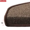 Close-up of a brown carpeted stair mat with a dark brown edge binding, showing a measurement of 3.5 cm. Produktbild-Vorschau