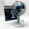 A white Rowenta fan is placed next to its packaging on a white surface. Anteprima dell’immagine prodotto