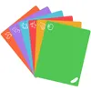 A set of colorful cutting boards fanned out against a white background. Produktbild-Vorschau