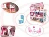 Collage of different views and accessories of a dollhouse. Voir les images du produit
