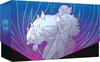 A box for a Pokemon trading card game product, featuring artwork of a character and a Pokemon. Voir les images du produit