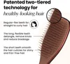 A close-up of a hairbrush with text describing its features. Anteprima dell’immagine prodotto