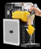 A hand is scooping slush ice from a machine into a martini glass. Produktbild-Vorschau
