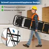 A man in work clothes carries a folded ladder in a room with kitchen cabinets. Podgląd zdjęcia produktu