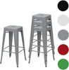 Two gray metal bar stools are shown against a white background. One stool is shorter and stands alone, while a taller stool is stacked with two others behind it. To the right of the stools are five colored circles: black, white, gray, red, and green. Produktbild-Vorschau