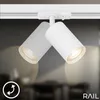 A close-up shot of a white dual spotlight track light fixture. Náhľad obrázku produktu