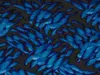 A close-up abstract pattern of blue shapes on a black background. Produktbild-Vorschau