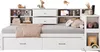 A white youth bed with integrated shelving and storage drawers, styled with decorative items. Náhled obrázku produktu