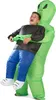 A child wearing an inflatable alien abduction costume. Produktbild-Vorschau