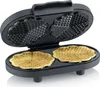 A close-up shot of a black heart-shaped waffle maker with two golden-brown waffles inside. Produktbild-Vorschau