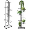 Two black metal plant stands are shown against a white background. The stand on the left is empty and has eight tiers. The stand on the right is filled with potted plants and has five tiers. Anteprima dell’immagine prodotto