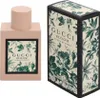 A bottle of Gucci Bloom Acqua di Fiori Eau de Toilette and its packaging are displayed side-by-side on a white background. Produktbild-Vorschau