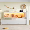 A white bed with storage drawers and a headboard featuring shelves and LED lighting. Voir les images du produit