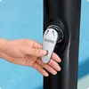A hand is shown adjusting the handle of a black shower column, with a blue background. Produktbild-Vorschau