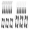 A set of cutlery arranged in a grid on a white background. Podgląd zdjęcia produktu