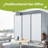 A room divider set up in a living room with a sofa, coffee table, and laptop. Podgląd zdjęcia produktu