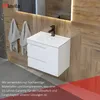 A modern bathroom vanity with a white sink and faucet, set against a wood-paneled wall. Produktbild-Vorschau