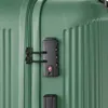 A close-up view of a green suitcase with a TSA-approved combination lock. Produktbild-Vorschau