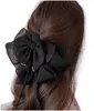 ECARLA dekorative Haarspange mit Schleife, schwarz 1 Stück. Produktbild-Vorschau 1