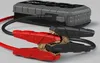 A close-up shot of a NOCO Boost GB150 jump starter with its red and black jumper cables attached. Produktbild-Vorschau
